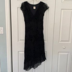 Black dress with sheer overlay